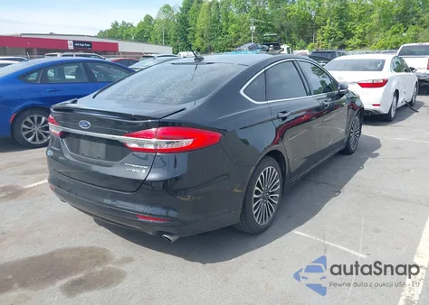 2018 Ford Fusion Hybrid Titanium from USA, damaged, VIN 3FA6P0RU6JR248661